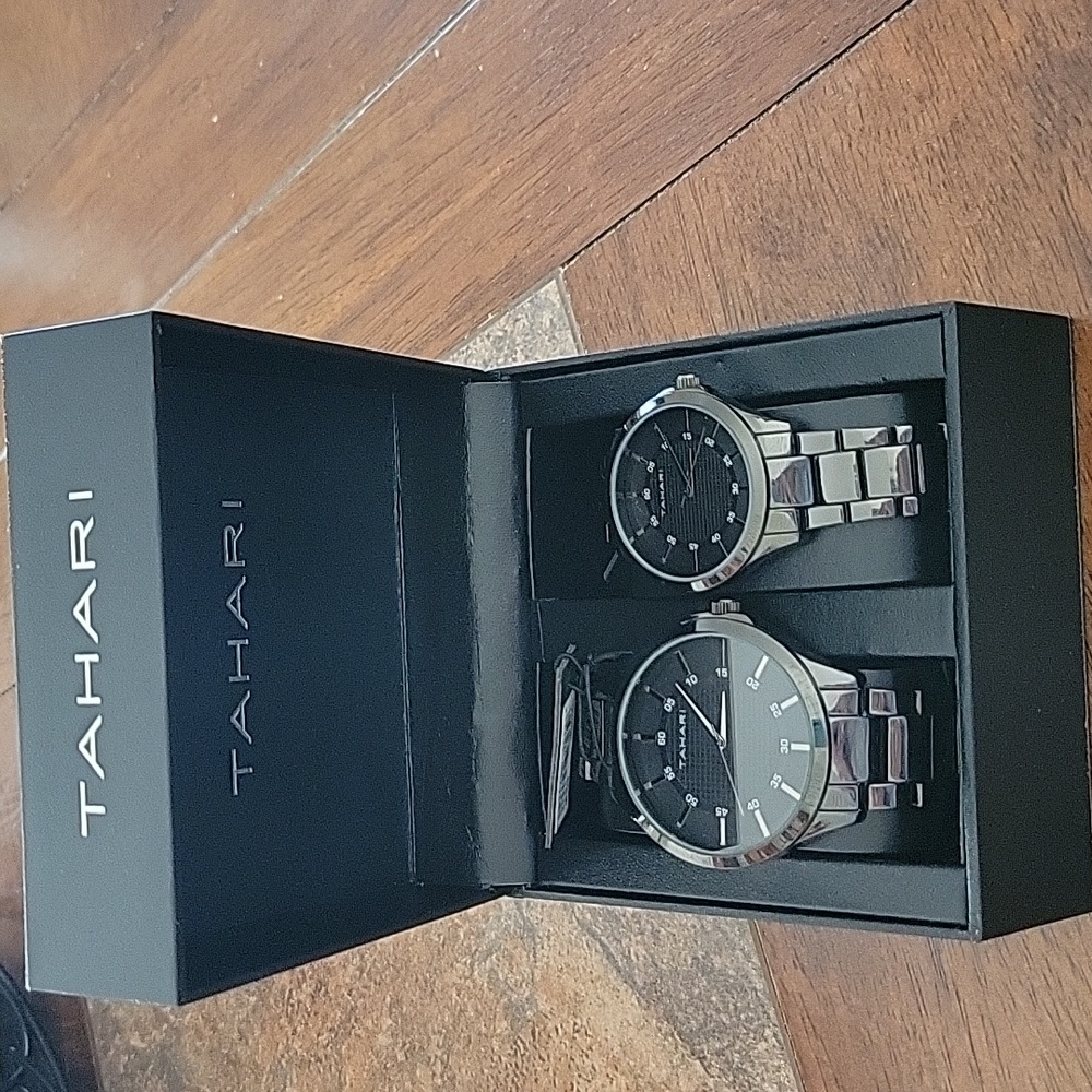 Tahari set of men & women watch